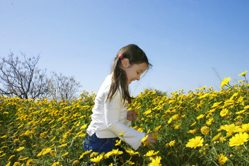 girl picking flowers