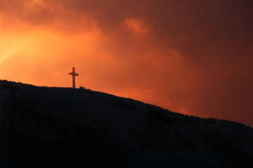 millennium cross washed in sunset