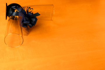 two glasses and a ribbon