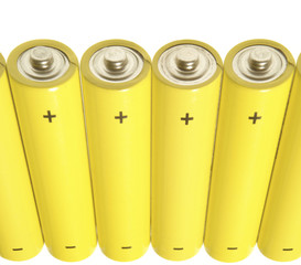 yellow batteries over white