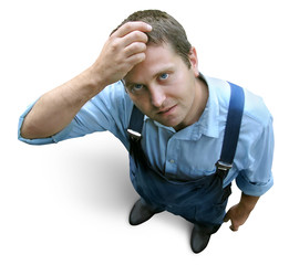 young worker in working clothes, wondering