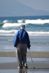 an old person on the beach