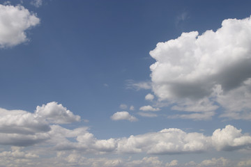 Fototapeta na wymiar white clouds on a blue sky