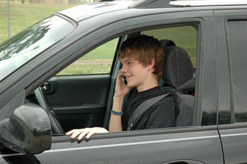 Fototapeta na wymiar teen driver with a cell phone