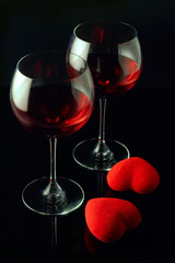 wine glasses and a two hearts