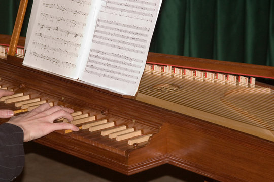playing on the clavecin
