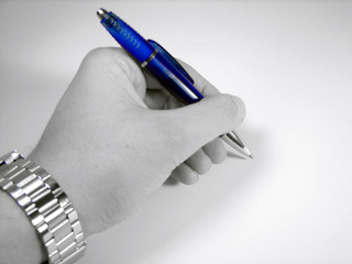 lefthanded man signing