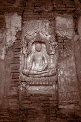 buddha carvings on wall