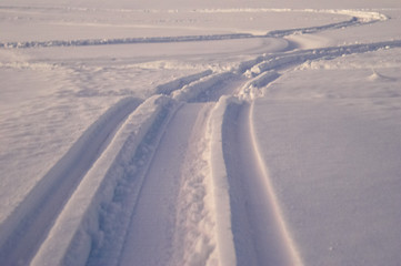 Fototapeta na wymiar tracks on snow