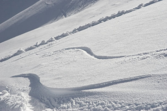 two snowboard waves