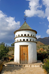 bird tower or dovecot on sunny spanish mountain