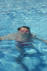 girl submerged in water