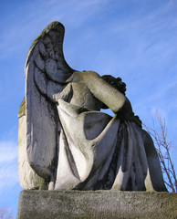 stone angel in a graveyard