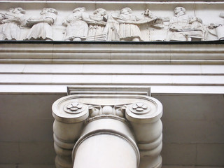 justice hall with ionic columns and decoration of