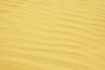 Fototapeta na wymiar pomarszczonej tle piasku