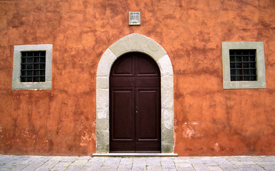 colorful door and windows in florence, italy.