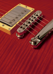 closeup of red electric guitar