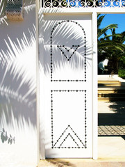 tunisian public house - white door.