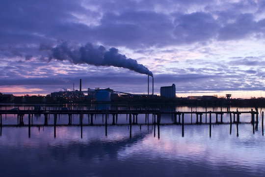 chimney and smoke at the blue hour