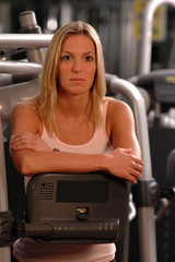Obraz na płótnie Canvas beautiful woman in fitness gym