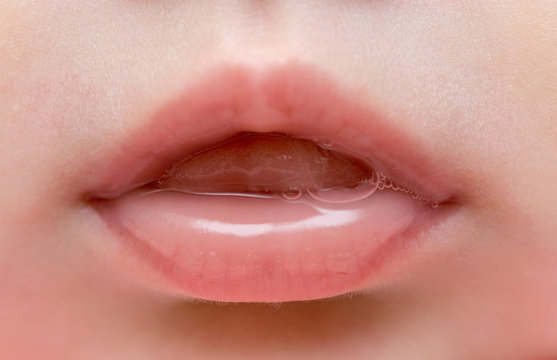 close up of lips of baby girl