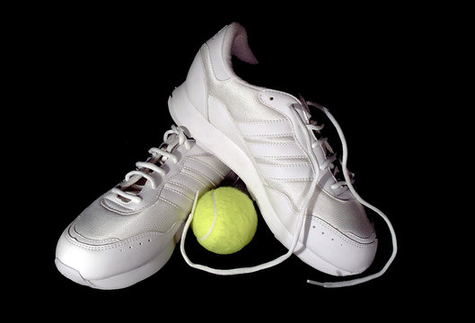 White Shoes And A Tennis Ball