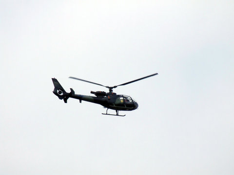helicopter flying away