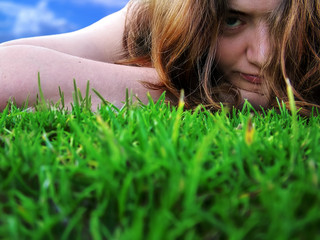 pretty, young woman/teenage girl  on the grass