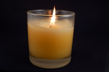 candle against black background
