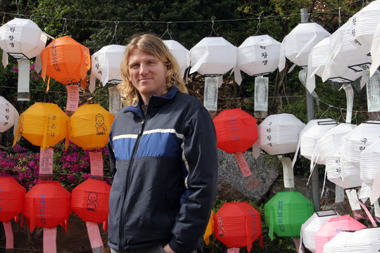 tourist looking at korean lanterns
