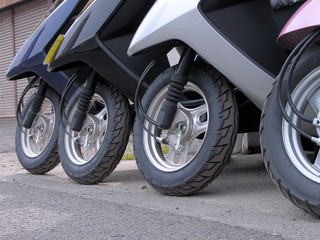 scooter wheels in a row