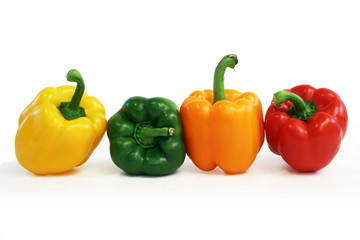 multicolored peppers lined up