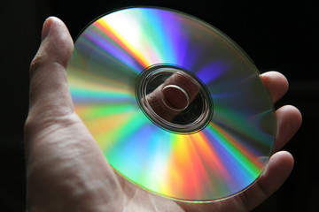 cd disk with rainbow reflections - obrazy, fototapety, plakaty