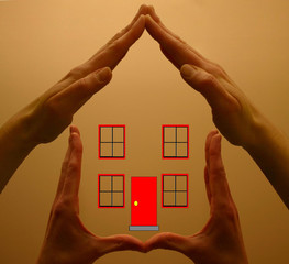 hands holding houses
