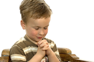 little boy praying