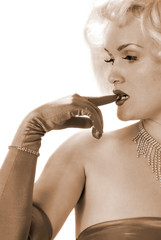 sexy marilyn impersonator biting on gloved finger