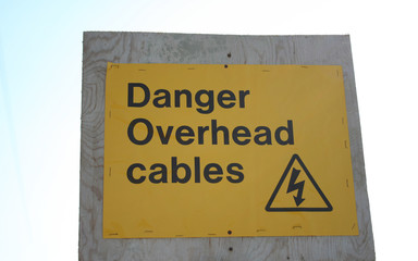 danger overhead cables sign