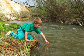 boy near the river