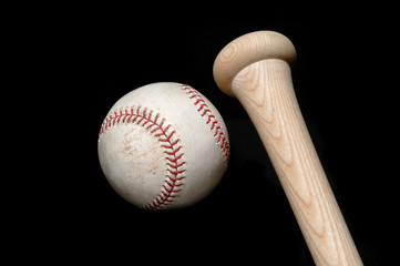baseball and bat on black