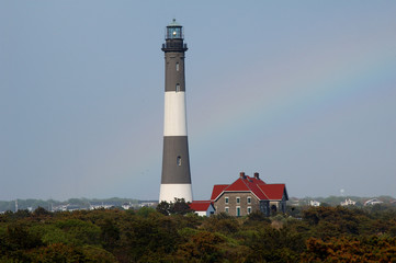 Fototapeta na wymiar lighthouse with rainbow