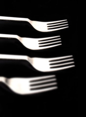 forks on black