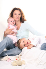 Fototapeta na wymiar son with mother and newborn sister