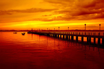 pier and boats at sunset