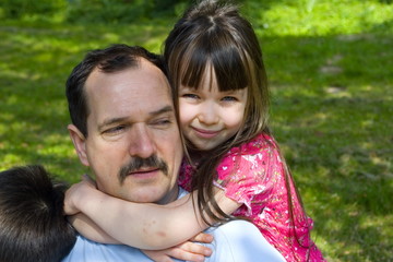 Fototapeta premium family in garden