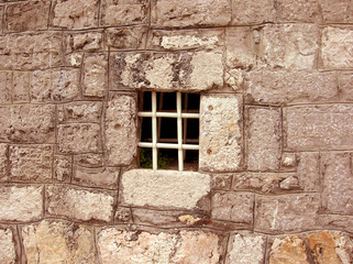Fototapeta na wymiar window of stone house