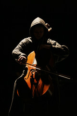 the musician with a violoncello © Tatiana Morozova