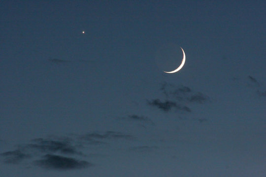 the moon and clouds at night
