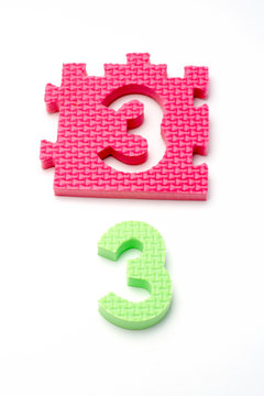number three puzzle mats. focus on the front (smal