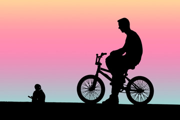 Obraz na płótnie Canvas Młody rowerzysta, sylwetka