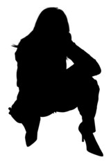 silhouette of woman squatting